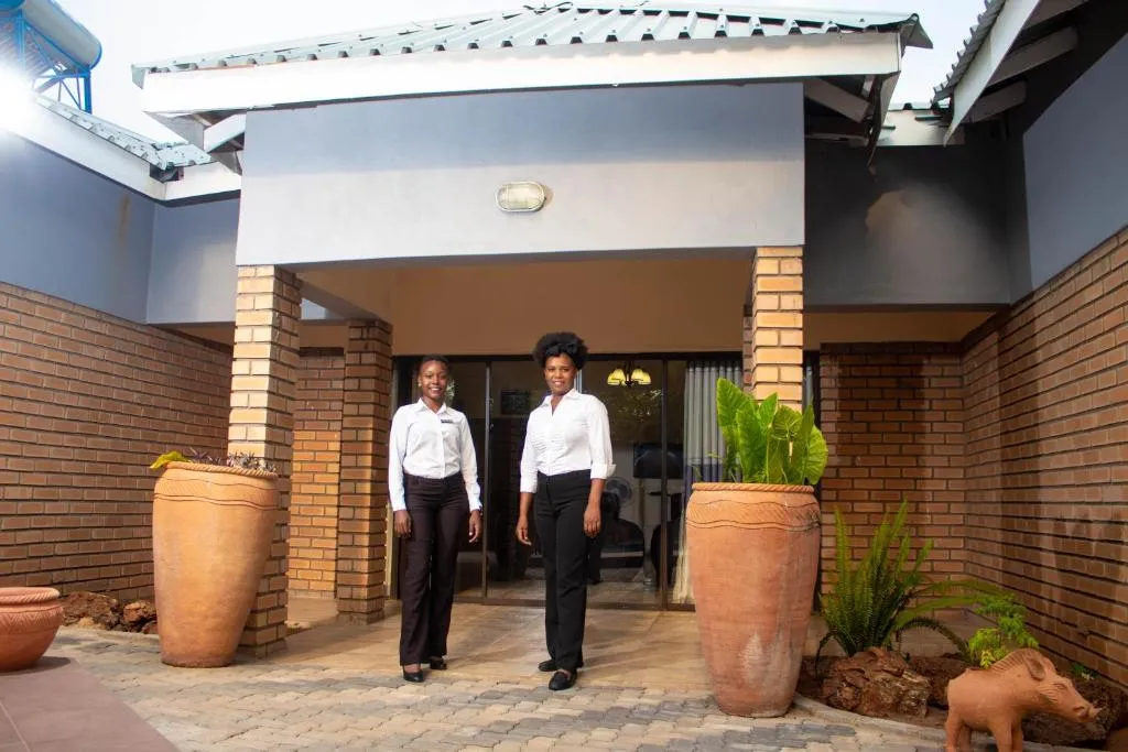 Staff at entrance